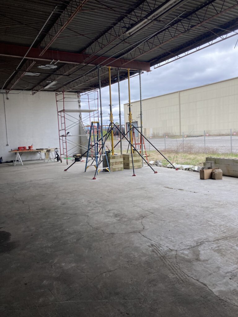 Jacking a beam into place